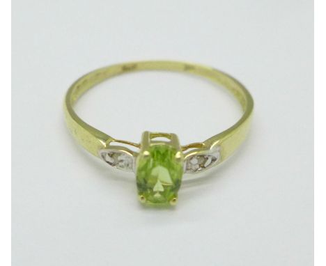 A 9ct gold, peridot and diamond ring, 1.0g, P