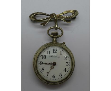 A silver and enamel Medana fob watch with bow brooch, enamel a/f