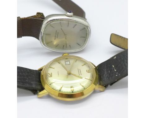 A Favre-Leuba wristwatch and a Timex automatic wristwatch with box