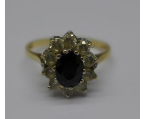 A 9ct gold, sapphire and white stone cluster ring, 2.4g, O