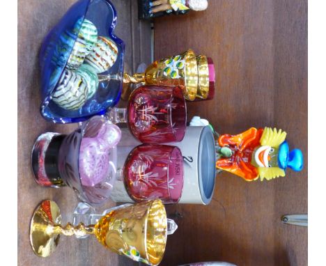 Glassware including Swarovski crystal swan, a Murano coloured glass clown, etc.