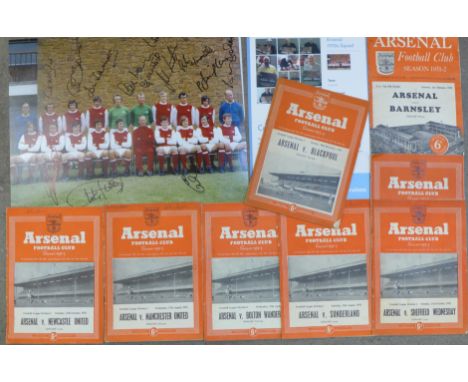 A large Arsenal FC signed team photograph, 1970's squad, signed 28/11/2010 with certificate of authenticity and eight Arsenal