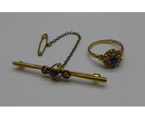 A 9ct gold stone set ring, 2.3g, L, and a yellow metal diamond and blue stone bar brooch, 3.3g