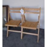 2 Folding Chairs.