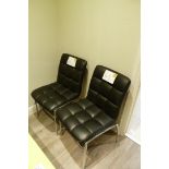 2 Chrome Framed Black Faux Leather Chairs.