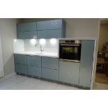 A Fitted Kitchen Display comprising: 2 Overhead Cupboards with servo drive, 875mm w; Larder Unit