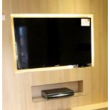 A Blaupunkt 50in Television with remote.