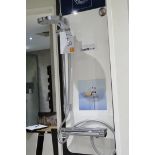 A Grohe G2000 Shower System with Mixer Taps, Shower Head and Riser Rail.