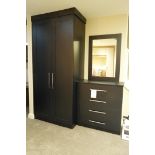 A Fitted Bedroom Display comprising: Double Door Wardrobe fitted with 9 drawers, 1046mm w x 2330mm h