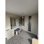 A Fitted Bedroom Display comprising: Vanity Unit, 2020mm with Mirror, 700 x 1000mm and Stool; and