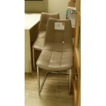 2 Beige Faux Leather Office Chairs.