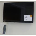 A Toshiba 24in Television with remote.