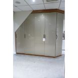An Understairs Fitted Wardrobe Display comprising: Double Door Wardrobe with Garment Hanger and 5