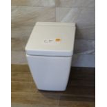 A VitrA Display Toilet with enclosed cistern.