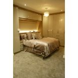 A Fitted Bedroom Display comprising: Corner Unit with 3 Wardrobes, 4 Drawers and Double Door Hanging