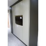 A 2 Tone Fitted Wardrobe Display comprising: 2 Wardrobes with Hanging and Self Space; 2 Central