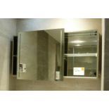A VitrA Mirrored Bathroom Cabinet with glass shelves and integral lighting, 1210mm w x 600mm h xx
