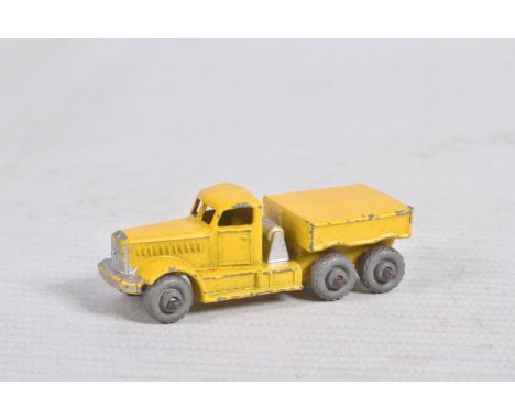 AN UNBOXED PLAYWORN MATCHBOX DIAMOND T PRIME MOVER, No.15, yellow with silver trim, hook, metal wheels, playworn condition wi