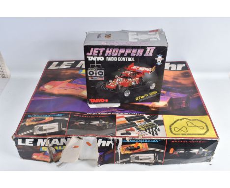 A BOXED BATTERY OPERATED JET HOPPER II TAIYO RADIO CONTROLLED BUGGY,  no. 8867, red body with advertisment detail, some label