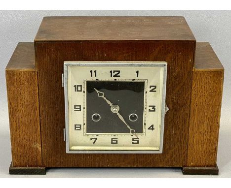 ART DECO OAK CASED MANTEL CLOCK - stepped top, square dial with Arabic numerals and chrome bezel, eight day movement striking