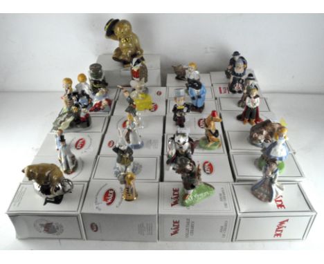 A collection of twenty nine Wade ceramic figures, various designs and models, including "The Wind in the WIllows", "Peter Pan