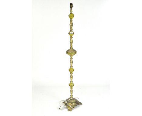A 20th century gilt metal standard lamp, with moulded decoration, on tripod base, missing shade, height 124cm