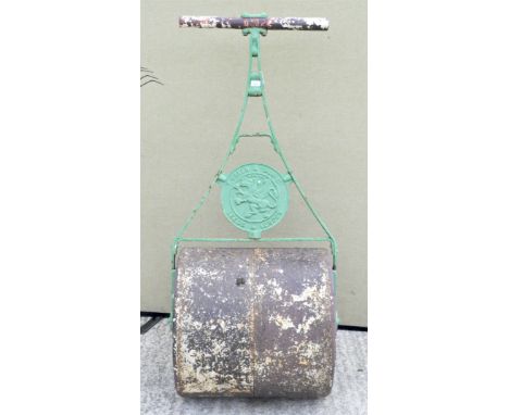 A T Green &amp; Son Ltd garden roller, painted in green, 163cm high overall