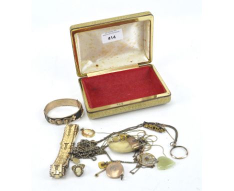 A selection of yellow metal costume jewellery, including chains, hinged bangle, rings, pendants and more