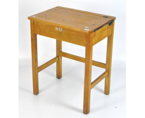 A vintage child's opening desk, with inkwell holder, 76cm x 61cm x 45cm 