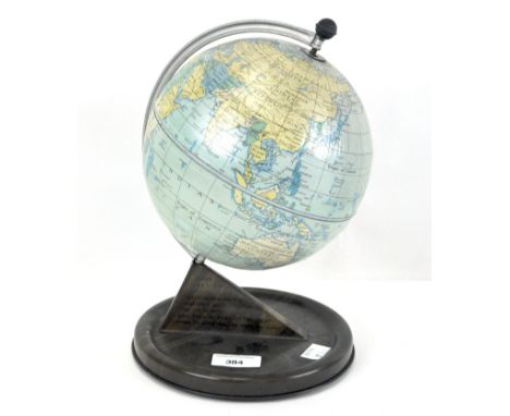 A vintage Chad Valley small globe, on tin base, 30cm high 