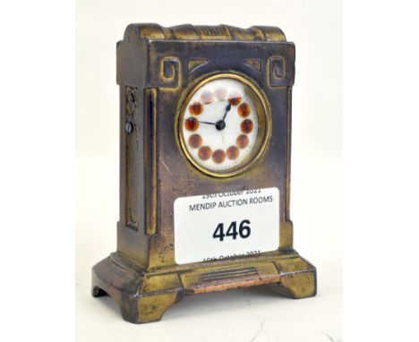An early 20th century German desk clock, gilt cased, the enamel dial with enamel disks denoting hours, 9cm high