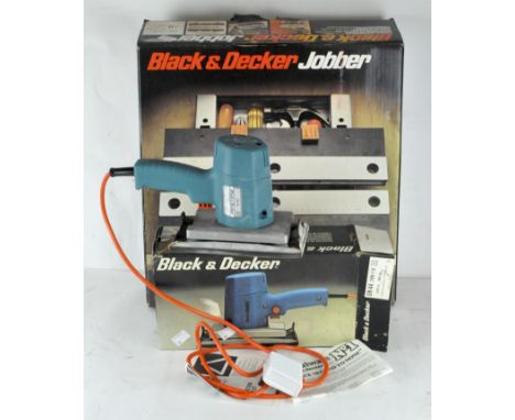 A Black and Decker 'Jobber' together with a Black and Decker sander, both in original boxes