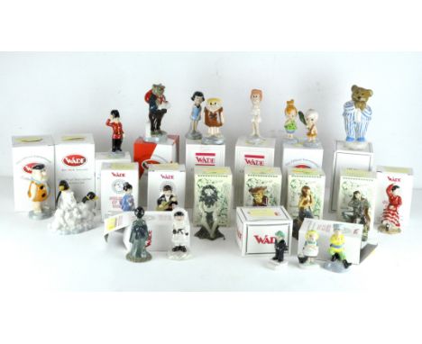 A collection of twenty three Wade ceramic figures, various designs, to include limited edition Flintstones figures, British M