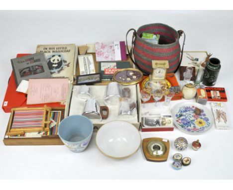 An assortment of collectables, to include games, black and white photographs, a quartz mantle clock, wall barometer and more