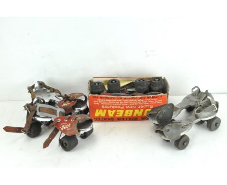 Three pairs of vintage roller skates, including a pair by Jaco and another by Sunbeam, in original box