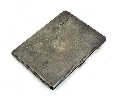 An Art Deco silver cigarette case of rectangular form, with engine turned outer and gilt interior, hallmarked Birmingham 1939