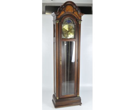 A contemporary long case clock by "Pearl" with striking movement, with domed top and metal dial with Arabic numerals denoting