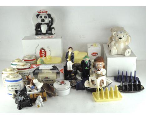 A collection of assorted Wade ceramic figures and wares, various designs and models, to include Tetley, Lurpak and alcohol ba