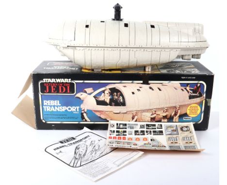 Vintage Boxed Palitoy Star Wars Return of The Jedi Rebel Transporter, in mint condition, accessories and parts, sealed in pla