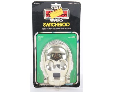 Kenner Star Wars Empire Strikes Back C-3PO Switcheroo, circa 1977 light switch cover, in mint condition, punched header card 