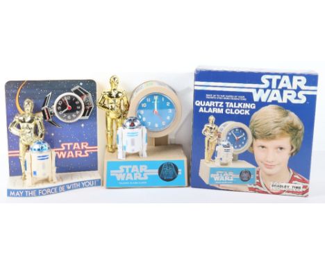 Vintage Bradley Time Star Wars Quartz Talking Alarm Clock, C-3PO and R2 D2 figurines, in mint boxed condition, circa 1984, pl