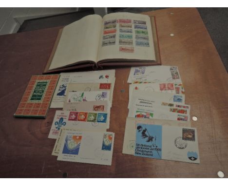 An album of Russian Stamps, mid 20th onwards, mainly used and a Boy Scout and Girl Guide Book of Stamps and Scouts Commemorat