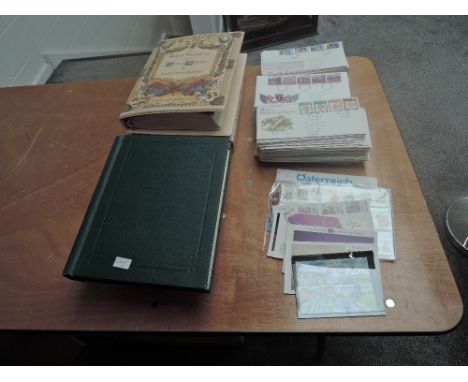 A collection of GB First Day Covers, 1980's onwards and a collection of GB, Commonwealth &amp; World Stamps in 4 albums, mint