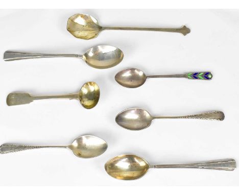 Seven hallmarked silver teaspoons of varying designs, one with green and blue enamel, various makers and marks, combined appr