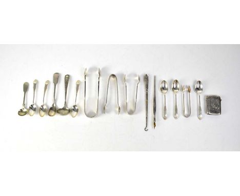 A quantity of hallmarked silver and white metal flatware to include coffee spoons, teaspoons, sugar tongs, sugar nips, small 