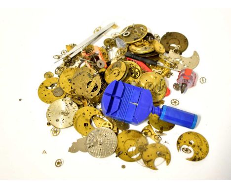 A quantity of watch tools, parts, movements, etc.