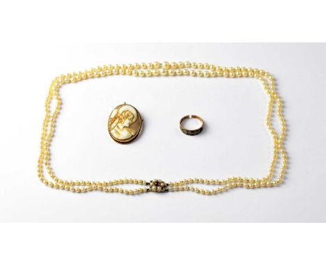 A double string necklace of graduated cultured pearls with 9ct gold pearl and red stone box snap clasp, a 9ct gold cameo broo