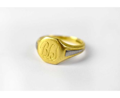 A 19th century 18ct yellow gold signet ring with white gold detail to the shoulders, initials 'BLS' to the table, Size R, app