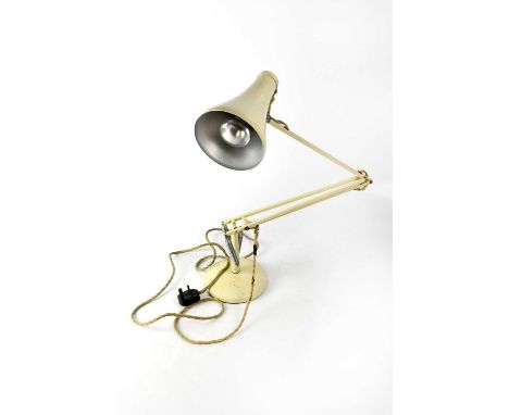 A vintage cream painted Anglepoise adjustable desk lamp on weighted circular base.Sold electrically untested.
