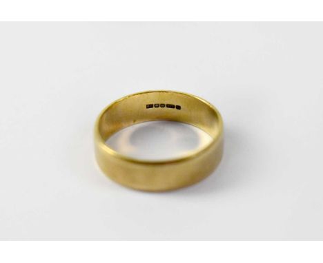 A 9ct gold band ring with chamfered edge, size R, approx. 3.3g.